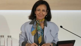 Ana Bot&iacute;n, CEO of Santander, speaking at a business conference, addressing financial strategies and global market trends.
