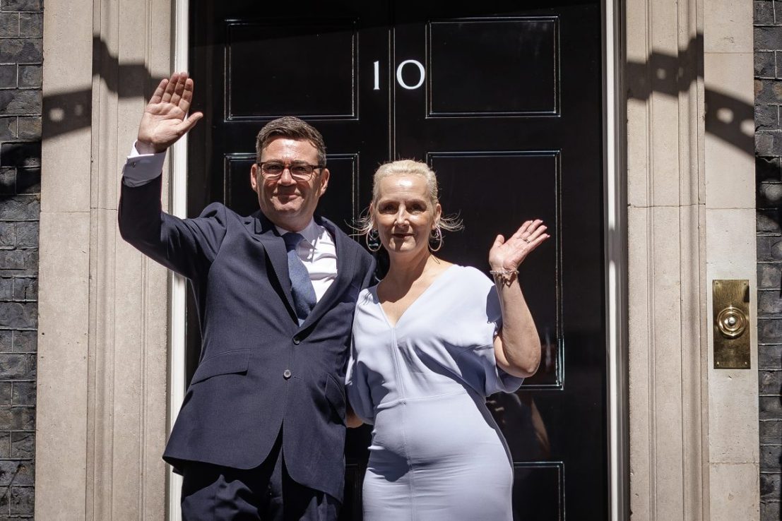 New Prime Minister and Leader of the Labour Party Andy Burnham, and wife Marie-France van Heel, pose on the steps of 10 Downing Street on July 20, 2026 in London, England. The Member of Parliament for Makerfield becomes the UK's 59th Prime Minister, succeeding Sir Keir Starmer, who resigned as leader of the Labour Party and Prime Minister in June. (Photo by Dan Kitwood/Getty Images)
