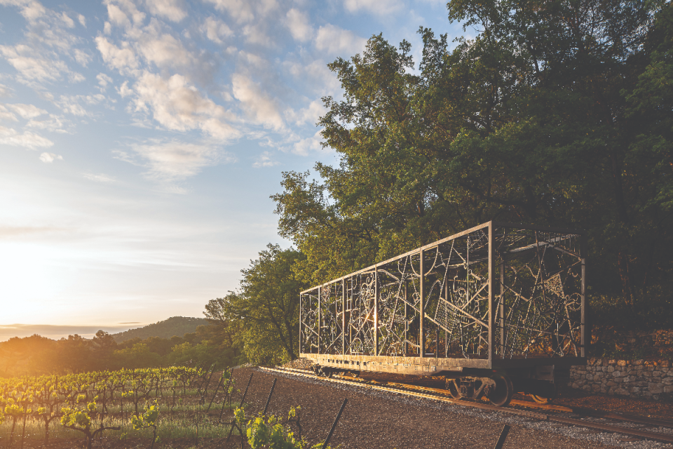 Billionaire former Claridges owners expansive French vineyard landscape under a clear sky