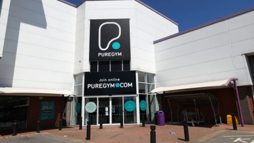 PureGym exterior with Join online PUREGYM.COM sign, indicating coronavirus easing and business reopening.