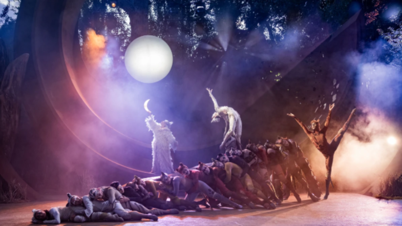 Cats musical at Regents Park Open Air Theatre, with costumed performers on stage under a full moon.