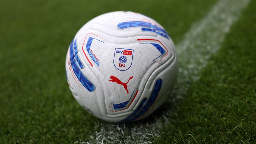Sky Bet EFL official match ball on green grass with a white line