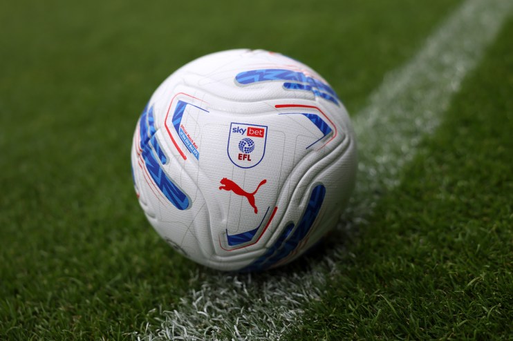 Sky Bet EFL official match ball on green grass with a white line