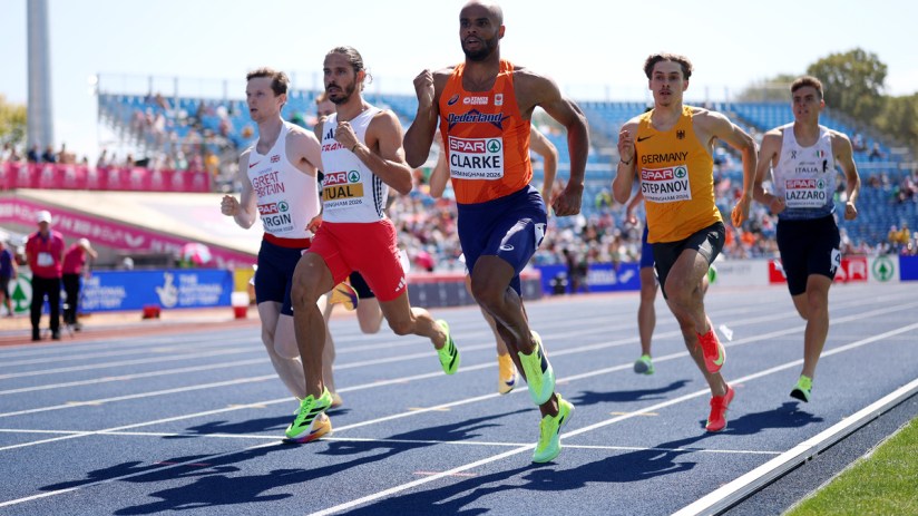 Runners from Great Britain, France, Netherlands, Germany, and Italy competing in a track event.