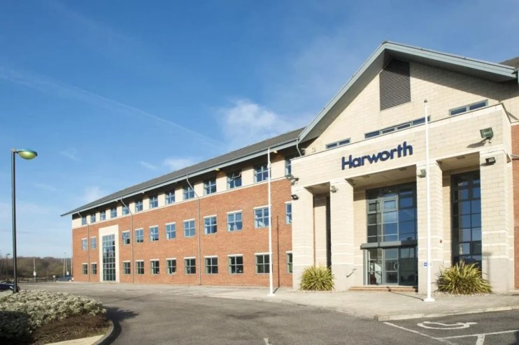 Harworth Group building exterior with a brick facade and prominent entrance under a blue sky