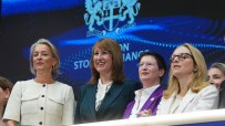 Julia Hoggett and Rachel Reeves with other women leaders at a financial event, discussing pension industry overhaul.