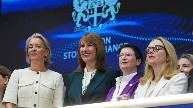 Julia Hoggett and Rachel Reeves with other women leaders at a financial event, discussing pension industry overhaul.
