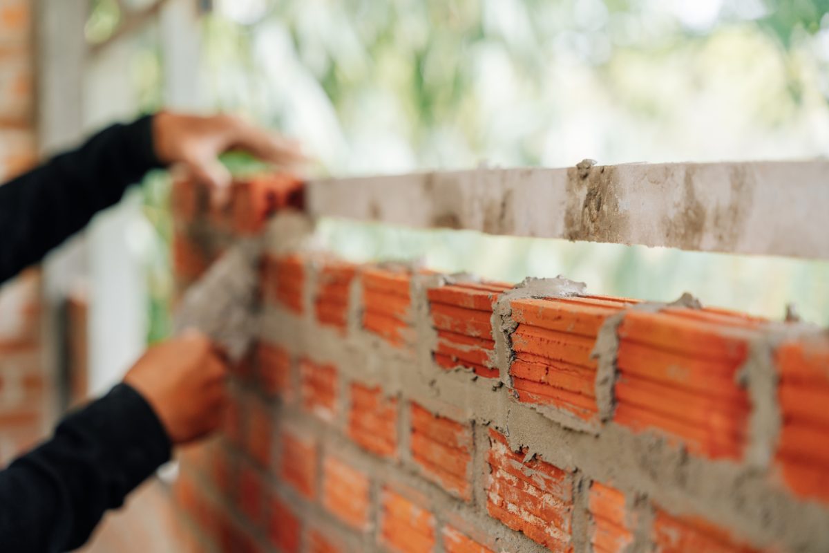 Ibstock swings to loss, cuts dividend amid building slump