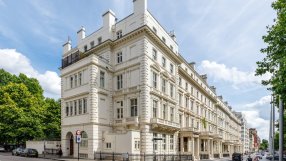 Elegant 5-bedroom residence at Princes Gate, London, with classical architecture and street view.
