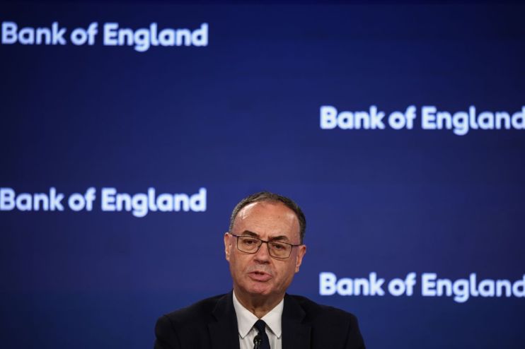 Andrew Bailey, Governor of the Bank of England, speaking at a press conference with the BoE logo in the background.