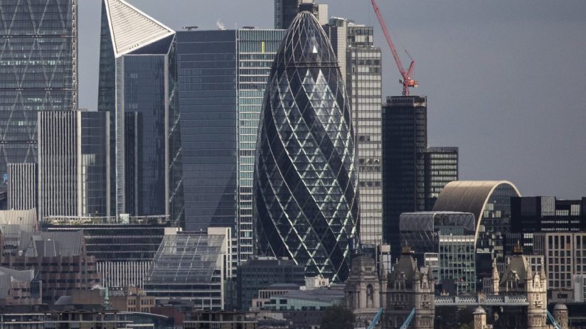 London skyline with the Gherkin skyscraper, other modern buildings, and a glimpse of Tower Bridge