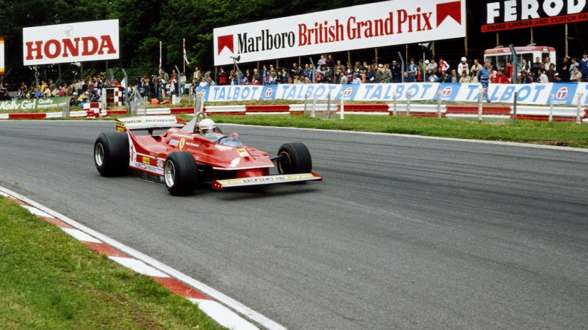 Red Formula 1 race car on track with Honda, Marlboro British Grand Prix, and Talbot signs