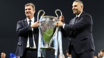 Khaldoon Al Mubarak and Ferran Soriano lift the UEFA Champions League trophy