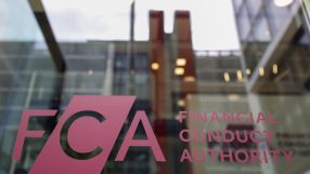 FCA logo and text Financial Conduct Authority on a glass building, reflecting the interior