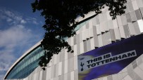 Tottenham Hotspur Stadium exterior with THIS IS TOTTENHAM on a large digital screen