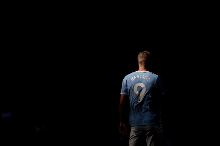 Erling Haalands light blue Manchester City jersey with number 9 and HAALAND on the back, from behind