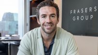 Michael Murray smiling, with FRASERS GROUP logo visible in background.
