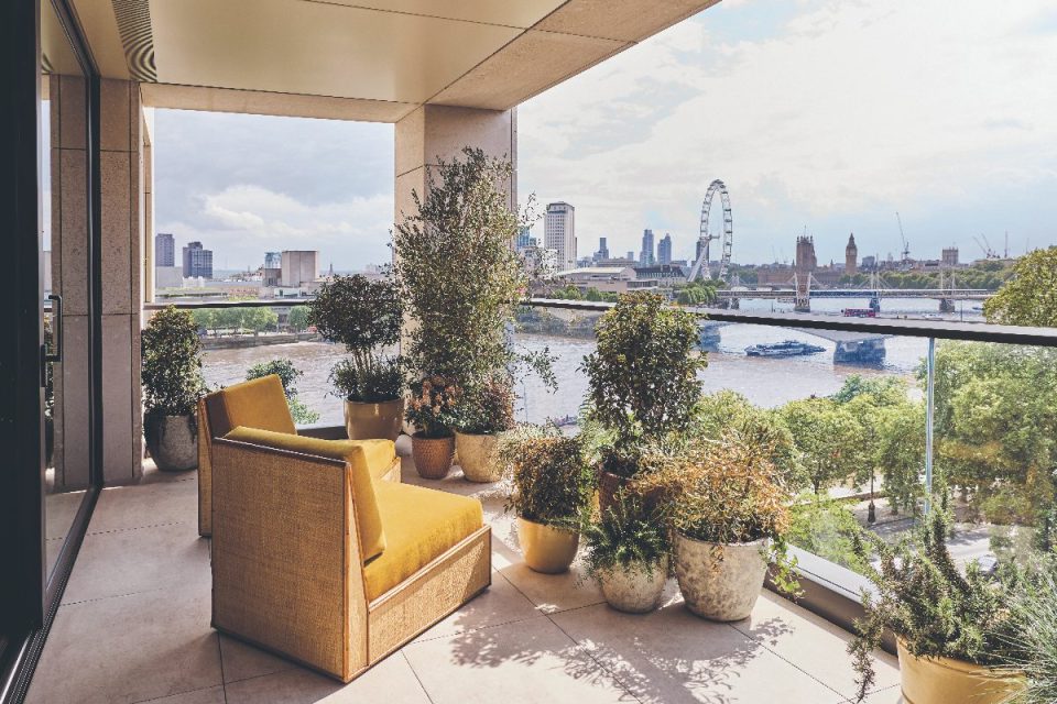 Balcony view of London skyline from St Clement hotel, including the London Eye, Big Ben, and the River Thames