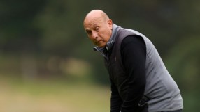 Surinder Arora, Heathrow bidder, in golf attire on a green course, looking towards the camera