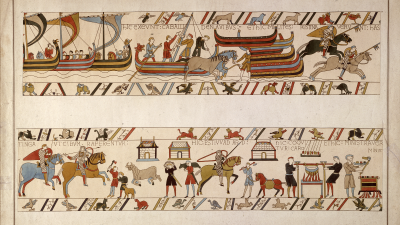 Detailed section of the Bayeux Tapestry showing soldiers, horses, ships, and daily life scenes.