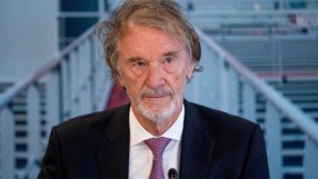 Jim Ratcliffe, founder of Ineos, wearing a dark suit, white shirt, and purple tie, looking forward.