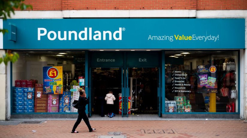 Poundland store exterior with Amazing Value Everyday! sign, featuring entrance, exit, and display windows.