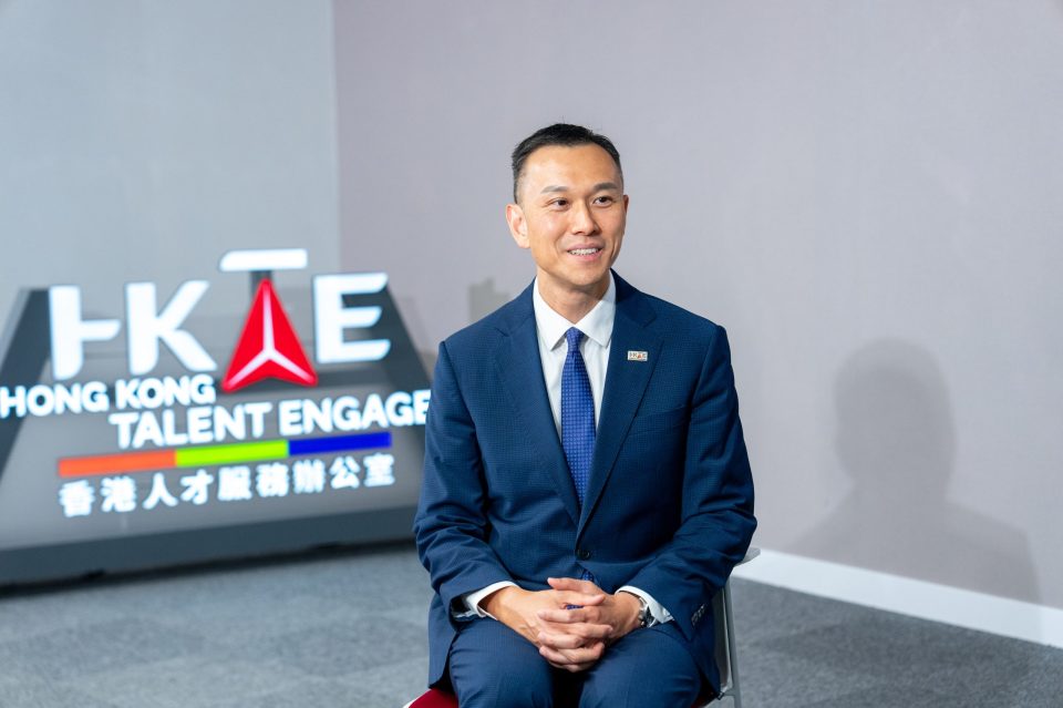 Felix Chan, Senior Principal Consultant, in a blue suit during an interview for Hong Kong Talent Engage