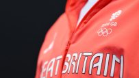 Close-up of a red Team GB Olympic jacket with the Olympic rings logo and GREAT BRITAIN text