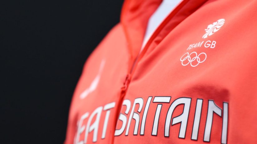 Close-up of a red Team GB Olympic jacket with the Olympic rings logo and GREAT BRITAIN text