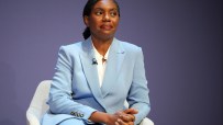Kemi Badenoch in a light blue suit, seated, speaking at the Conservative Party Conference 2026.