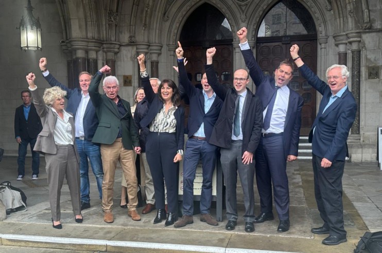 Jubilant Libor traders celebrate outside court after their convictions were overturned.