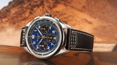Gallet 1826 chronograph watch with blue dial, orange hands, and black leather strap
