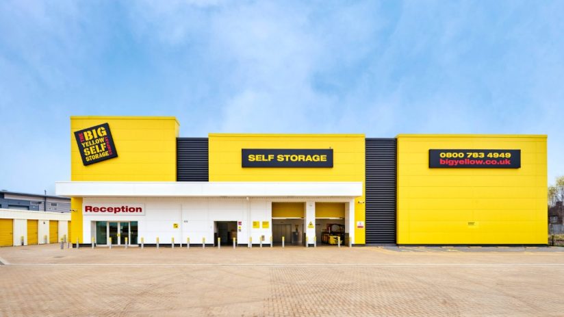 Big Yellow Self Storage facility exterior with yellow facade, reception entrance, and SELF STORAGE sign under a blue sky