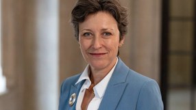 Katharine Braddick, Prudential Regulation Authority chief, smiling in a blue blazer. Banking watchdog leader.