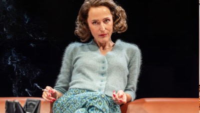 Gillian Anderson as Martha in Whos Afraid of Virginia Woolf?, holding a cigarette with smoke curling upwards.
