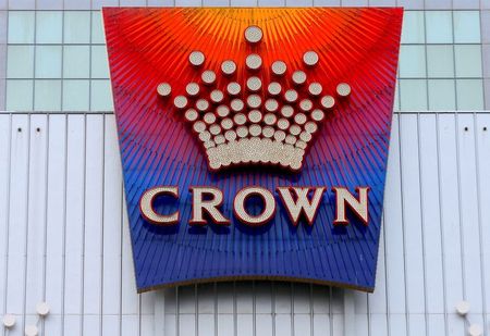 The logo of Australian casino giant Crown Resorts Ltd adorns the hotel and casino complex in Melbourne, Australia (REUTERS/Jason Reed)