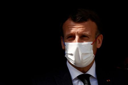 FILE PHOTO: French President Macron visits a child psychiatry department at Reims hospital